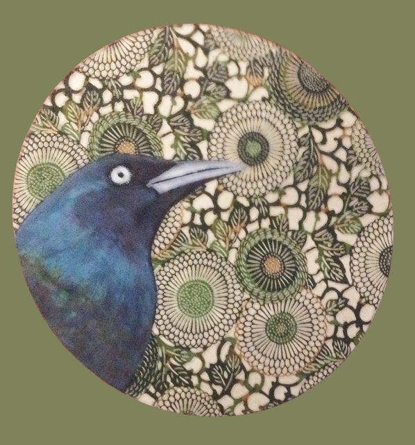 Blackbird on flowers